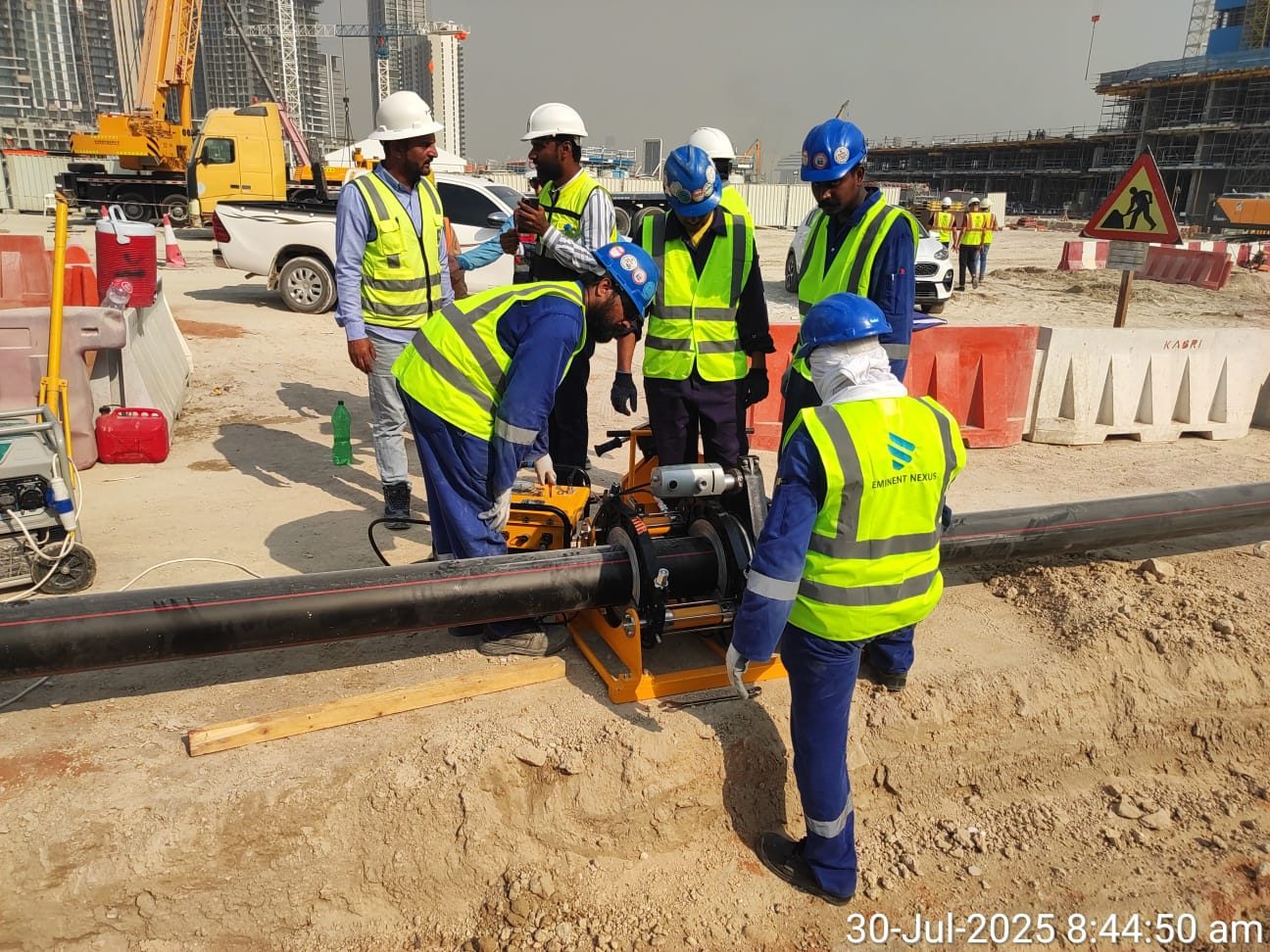 Site crew installing hydrant pipework at Dubai Creek Harbour